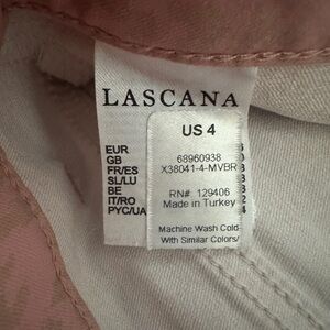 skinny legged, pastel pink, animal print pants